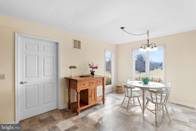 dining room with an inviting chandelier