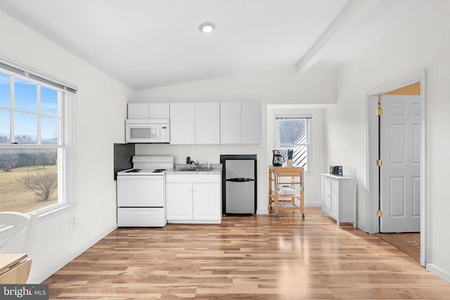 kitchen featuring sink, white appliances, vaulted ceiling with beams, light hardwood / wood-style floors, and white cabinets