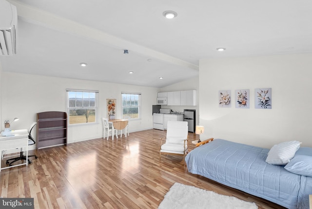 bedroom with vaulted ceiling with beams, a wall mounted air conditioner, and light hardwood / wood-style floors