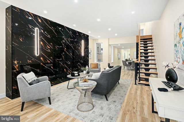 living room with light hardwood / wood-style floors