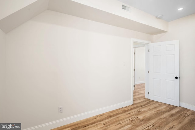 bonus room with light hardwood / wood-style floors