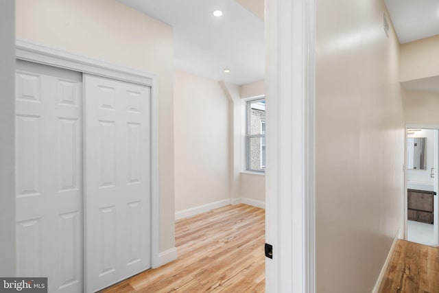 hall featuring light hardwood / wood-style flooring