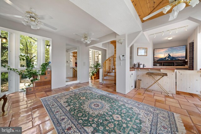 12330 Potomac View Rd, Newburg, MD 20664 - foyer entrance with track lighting, a ceiling fan, and stairs