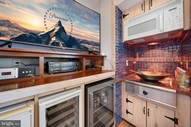 12330 Potomac View Rd, Newburg, MD 20664 - indoor dry bar featuring white microwave, beverage cooler, and tasteful backsplash