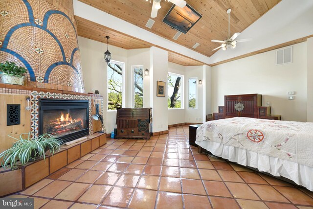 12330 Potomac View Rd, Newburg, MD 20664 - bedroom featuring wooden ceiling, a tiled fireplace, tile patterned floors, and high vaulted ceiling