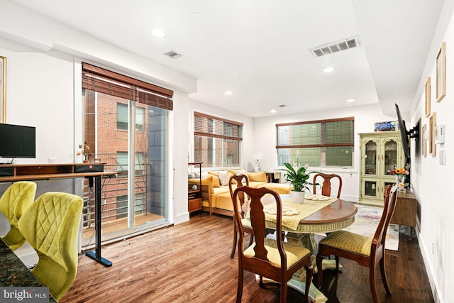 dining room featuring wood-type flooring