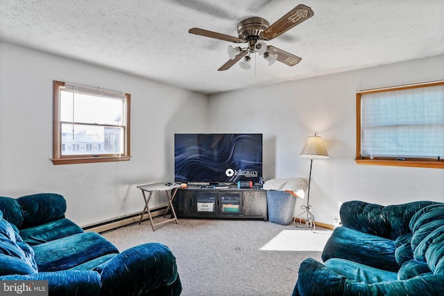 carpeted living room featuring ceiling fan, a textured ceiling, and a baseboard heating unit