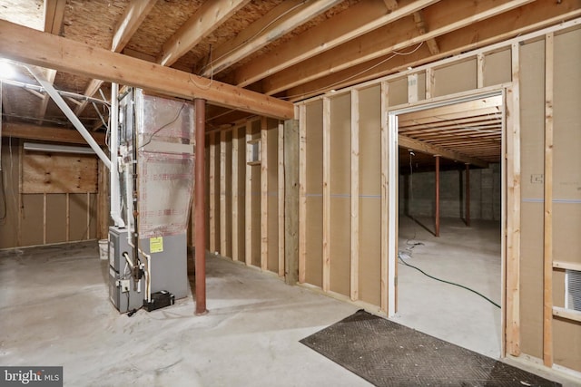 basement featuring heating unit