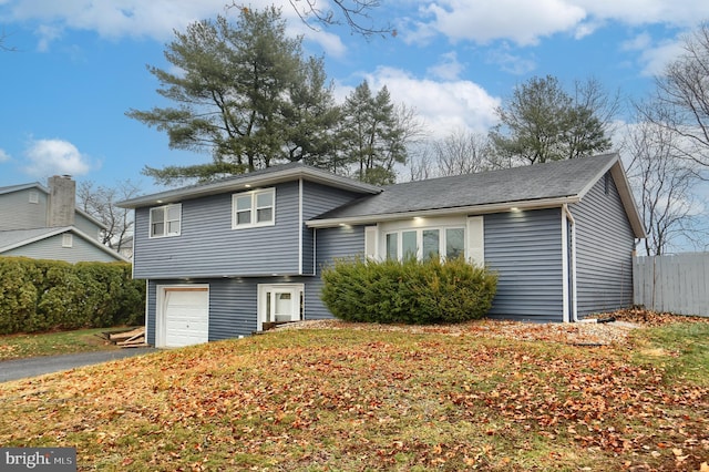 split level home with a garage