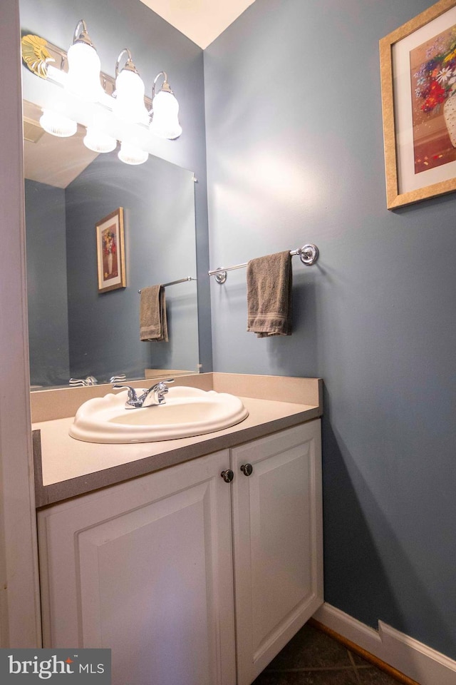 bathroom featuring tile patterned floors and vanity