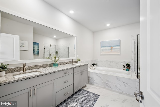 bathroom with plus walk in shower and vanity