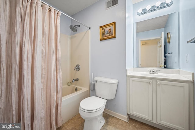 full bathroom with tile patterned flooring, vanity, toilet, and shower / bath combo with shower curtain