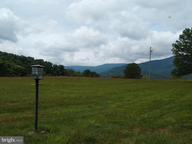 property view of mountains with a rural view