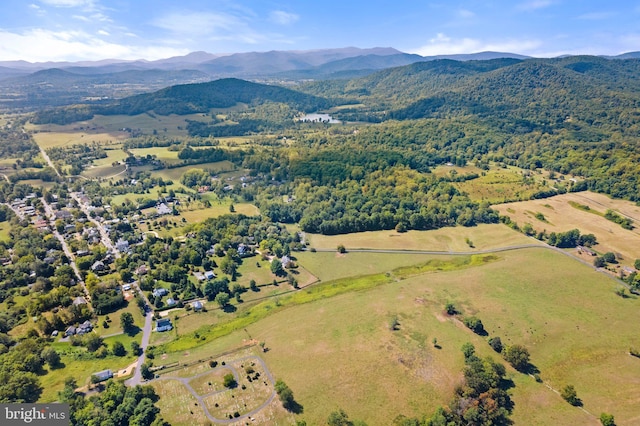 birds eye view of property featuring a mountain view