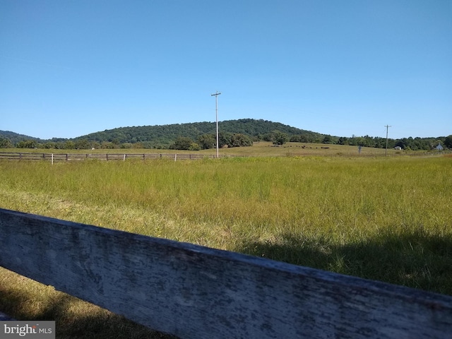 view of mountain feature with a rural view