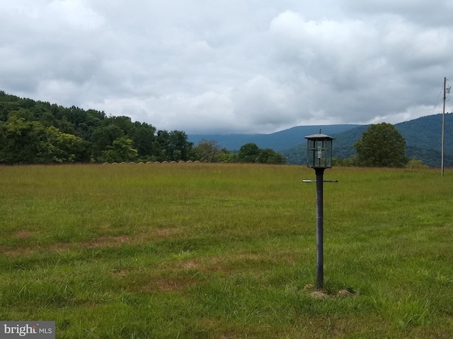 exterior space with a rural view