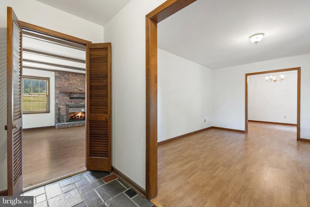 interior space featuring dark hardwood / wood-style floors and a notable chandelier