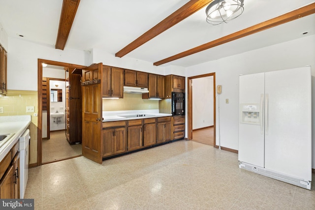 kitchen with beam ceiling, white appliances, and backsplash