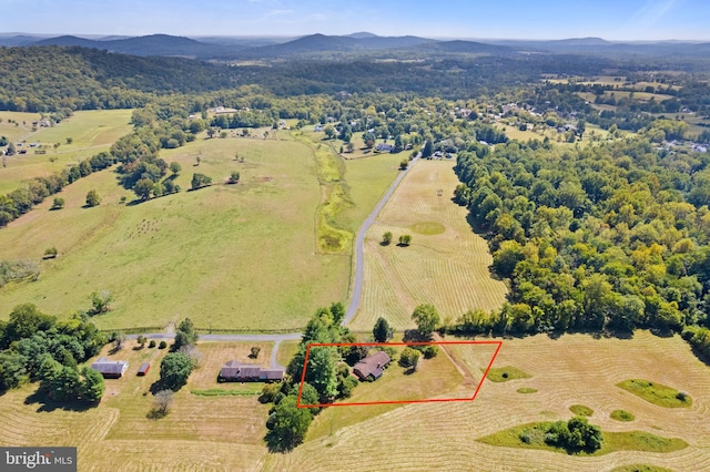 bird's eye view with a mountain view and a rural view