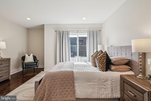 bedroom featuring dark hardwood / wood-style flooring