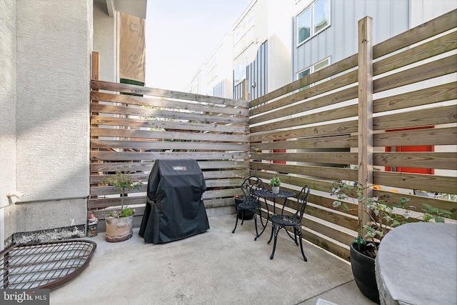 view of patio with a grill