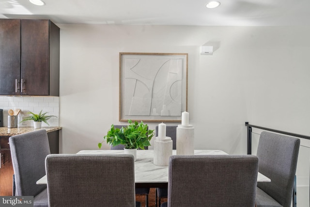 dining area featuring hardwood / wood-style floors