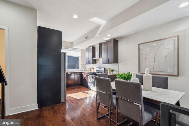 dining space featuring dark wood-type flooring