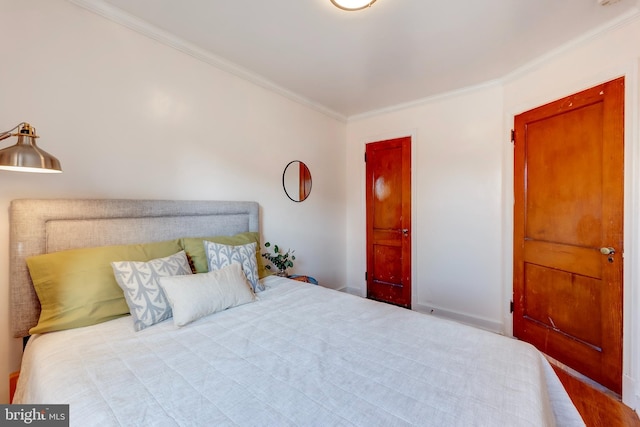 bedroom with ornamental molding