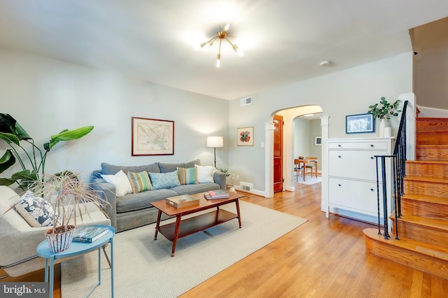 living room with light hardwood / wood-style floors