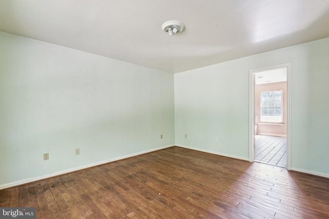 14413 Bittersweet Dr, Hughesville, MD 20637 - unfurnished room with wood-type flooring and baseboards