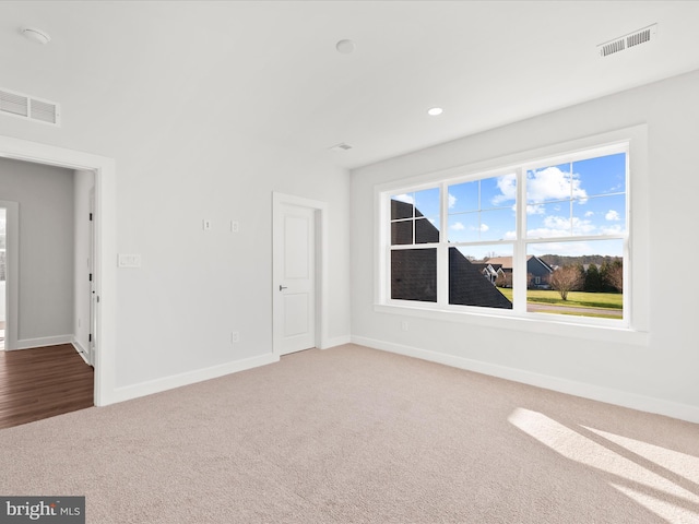 empty room with carpet floors