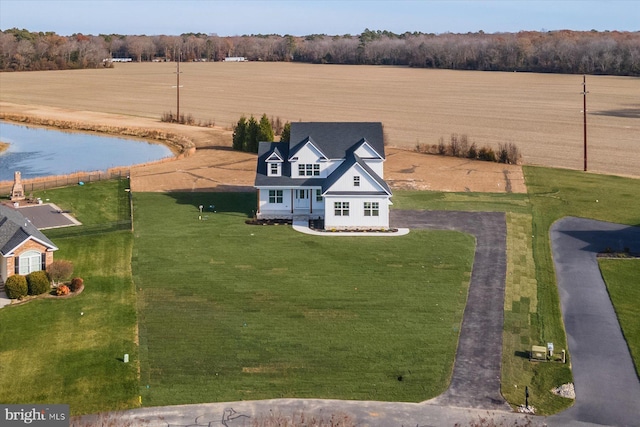 aerial view with a rural view and a water view