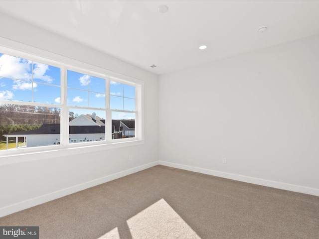 view of carpeted spare room