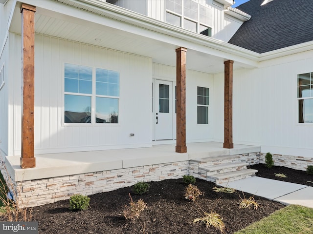 entrance to property with covered porch