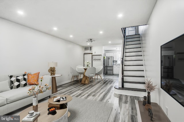 living room with light hardwood / wood-style floors