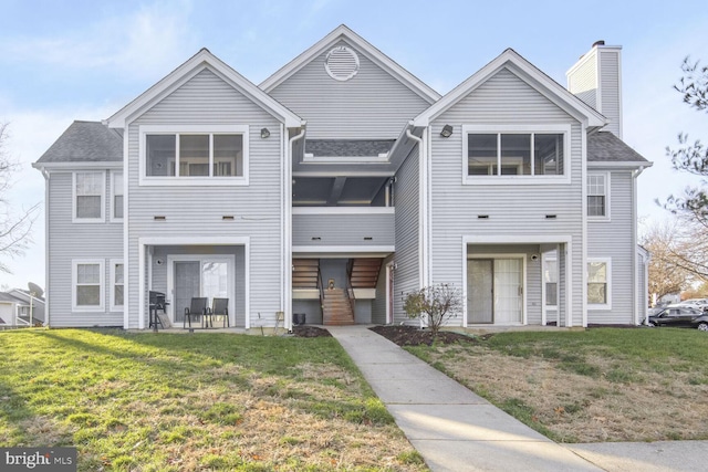 view of front of property with a front lawn