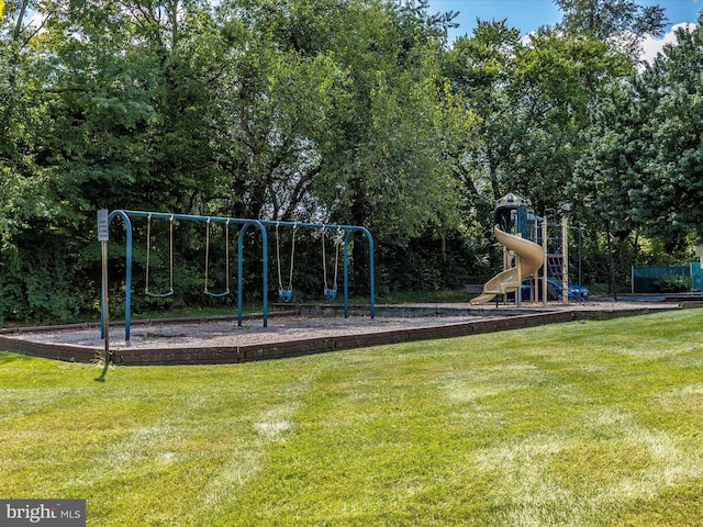 view of jungle gym with a yard