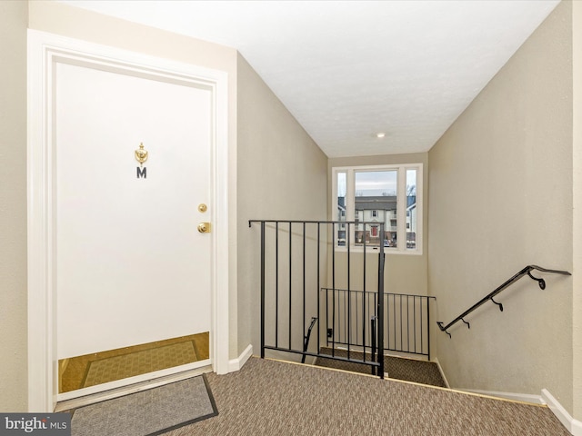 entrance to property with a balcony