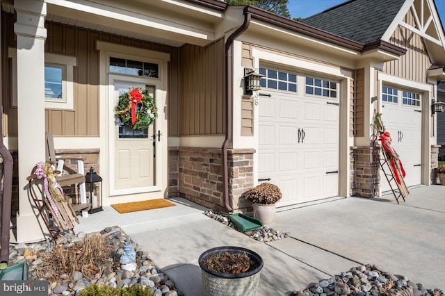 view of exterior entry featuring a garage