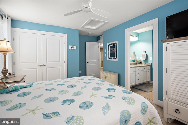 bedroom featuring ceiling fan, ensuite bathroom, and a closet