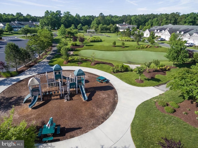 view of home's community featuring a playground