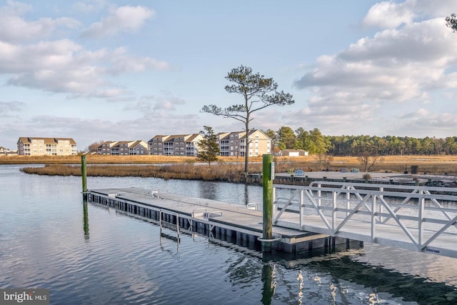 dock area featuring a water view