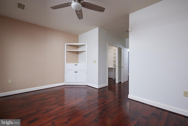 interior space featuring ceiling fan and dark wood-type flooring