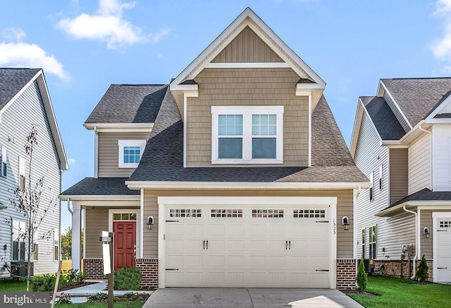 craftsman house with a garage