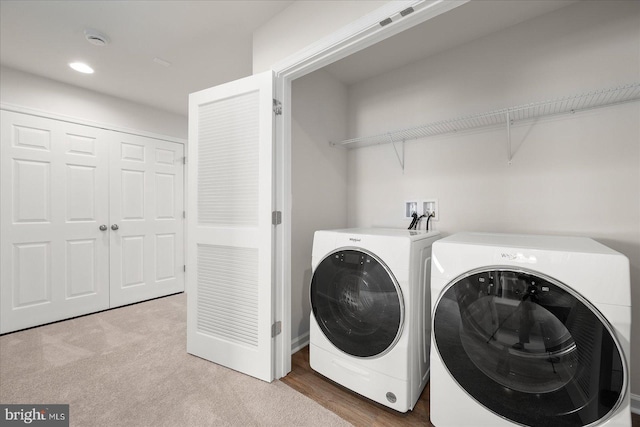 laundry room featuring carpet flooring and independent washer and dryer