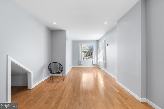 hallway featuring light hardwood / wood-style flooring