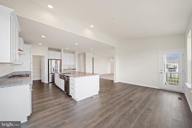 635 Corbit Dr, Middletown, DE 19709 - kitchen with stainless steel appliances, dark wood-style flooring, white cabinetry, a sink, and recessed lighting