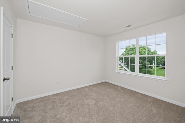 635 Corbit Dr, Middletown, DE 19709 - carpeted spare room featuring attic access and baseboards