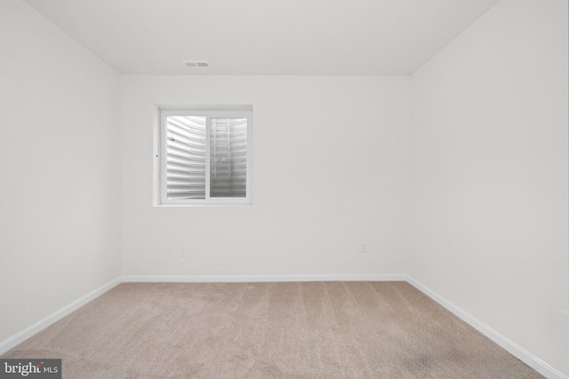 635 Corbit Dr, Middletown, DE 19709 - spare room with light colored carpet and baseboards