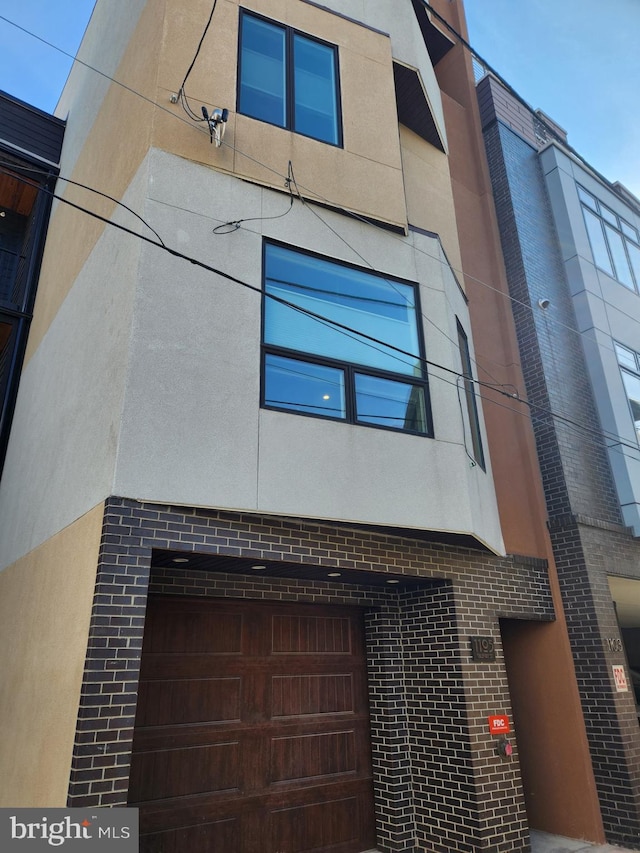 exterior space featuring a garage